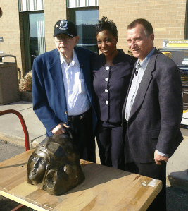 Former POW Wally Grotz, UPS Sales Representative Lisa Anderson, and Wally's son, Jim Grotz