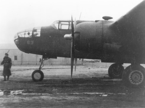 Another one of Doolittle's B-25's at Wold-Chamberlin Field in Minneapolis. This picture is significant for two reasons. First, it is taken inside the securty zone, perhaps by a contractor.  Second, is the presence of an armed sentry.  The sentry provides importance to the secrecry and military importance of the modificaitons being conducted on the B-25's.