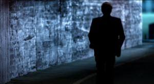 Clint Eastwood emerging from the shadows in Chrysler's "Halftime in America." 