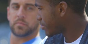 Packers quarterback Aaron Rogers talking with a Antwan from Milwaukee's Operation Dream